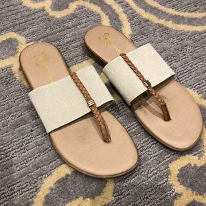 Shimmery gold flip flop sandals
